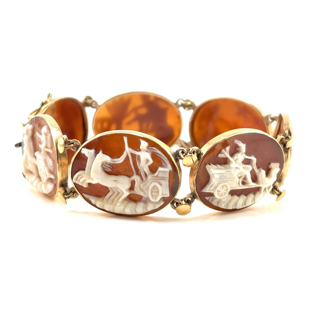 antique hand carved cameo bracelet with yellow goldbzels and linked together with yellow gold